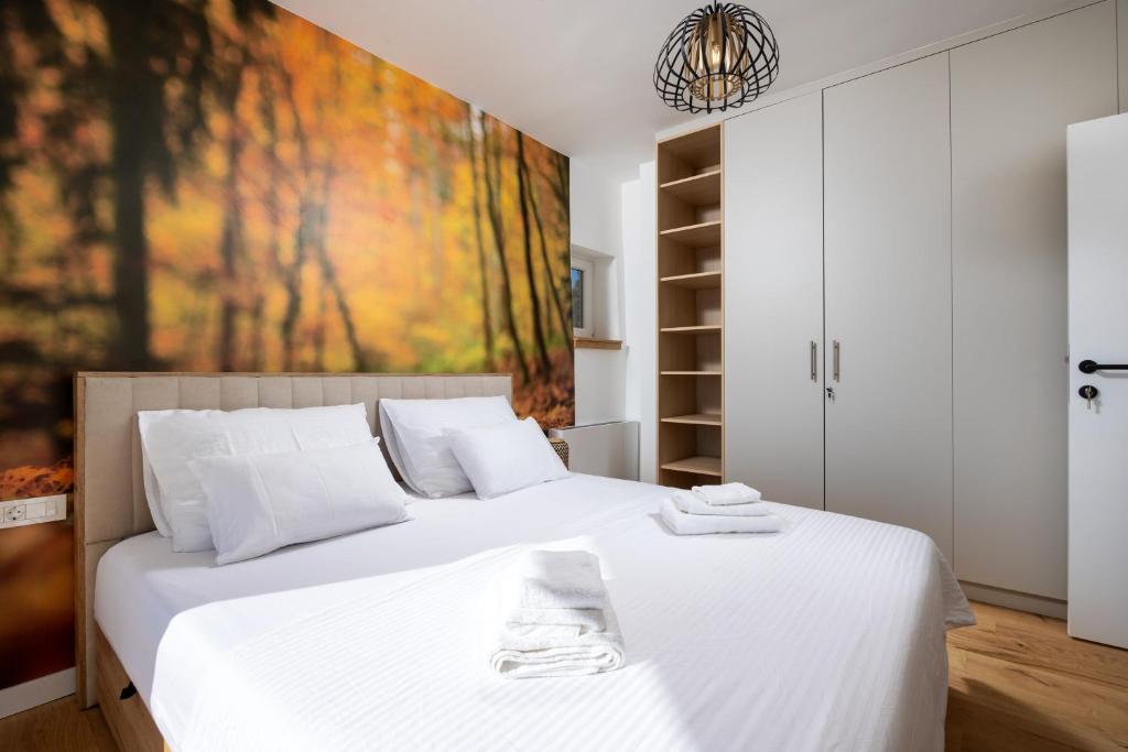 Bedroom with autumn forest mural