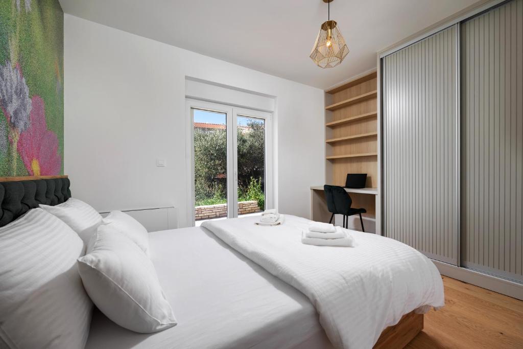 Bedroom with flower mural and garden door