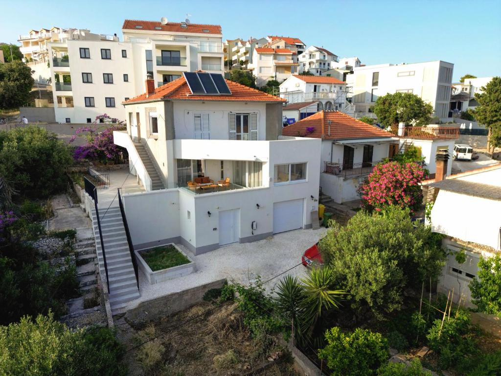 Aerial view of the house and solar panels